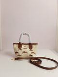 Long champ raffia small size in camel