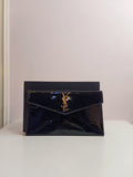 YSL clutch in shiny black-gold