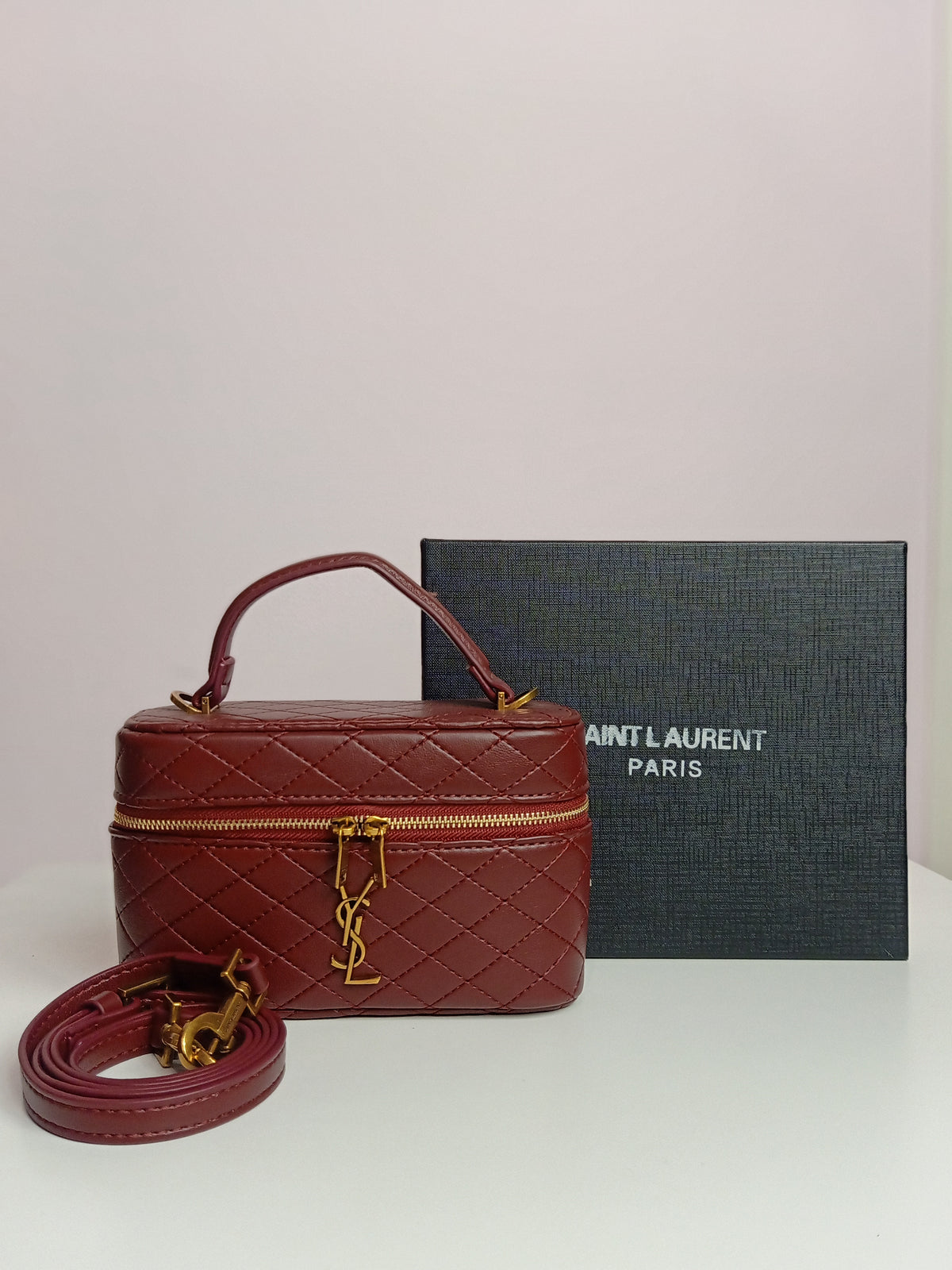 YSL vanity bag in burgundy