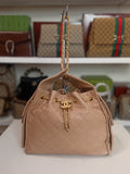 Chanel 25 in beige