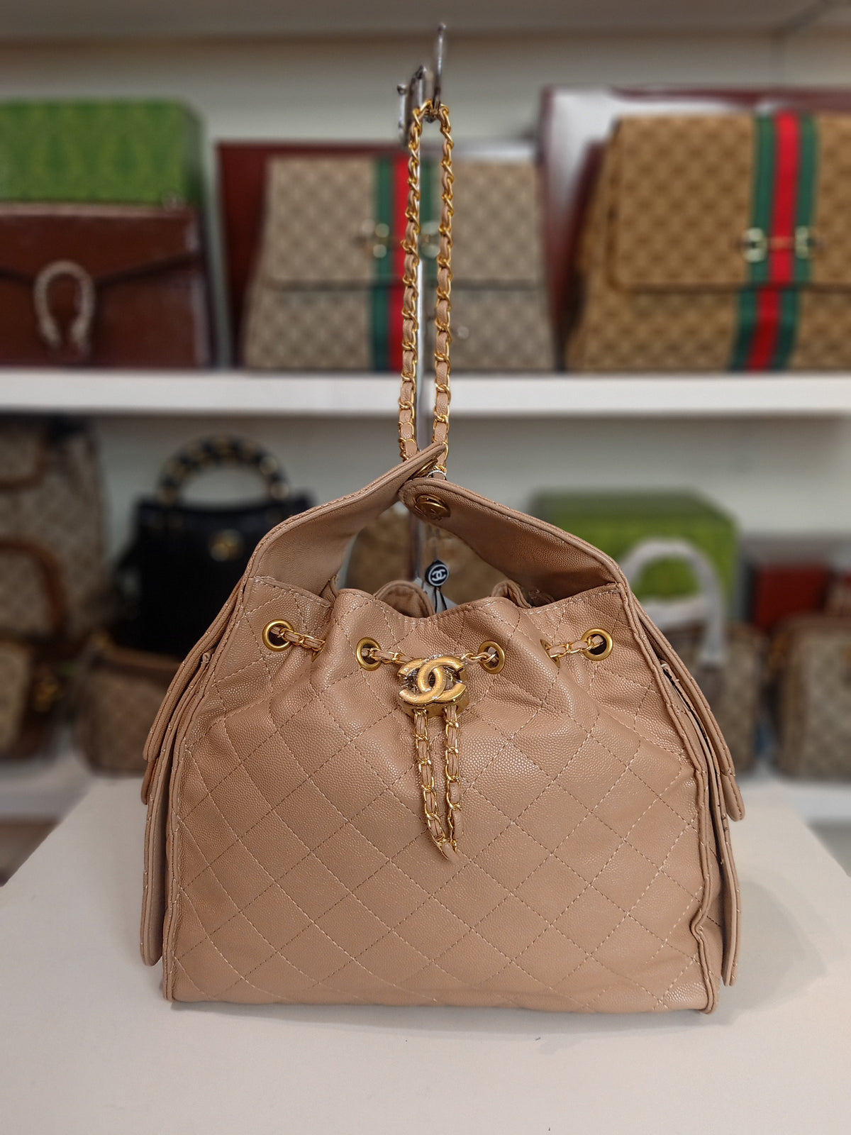 Chanel 25 in beige