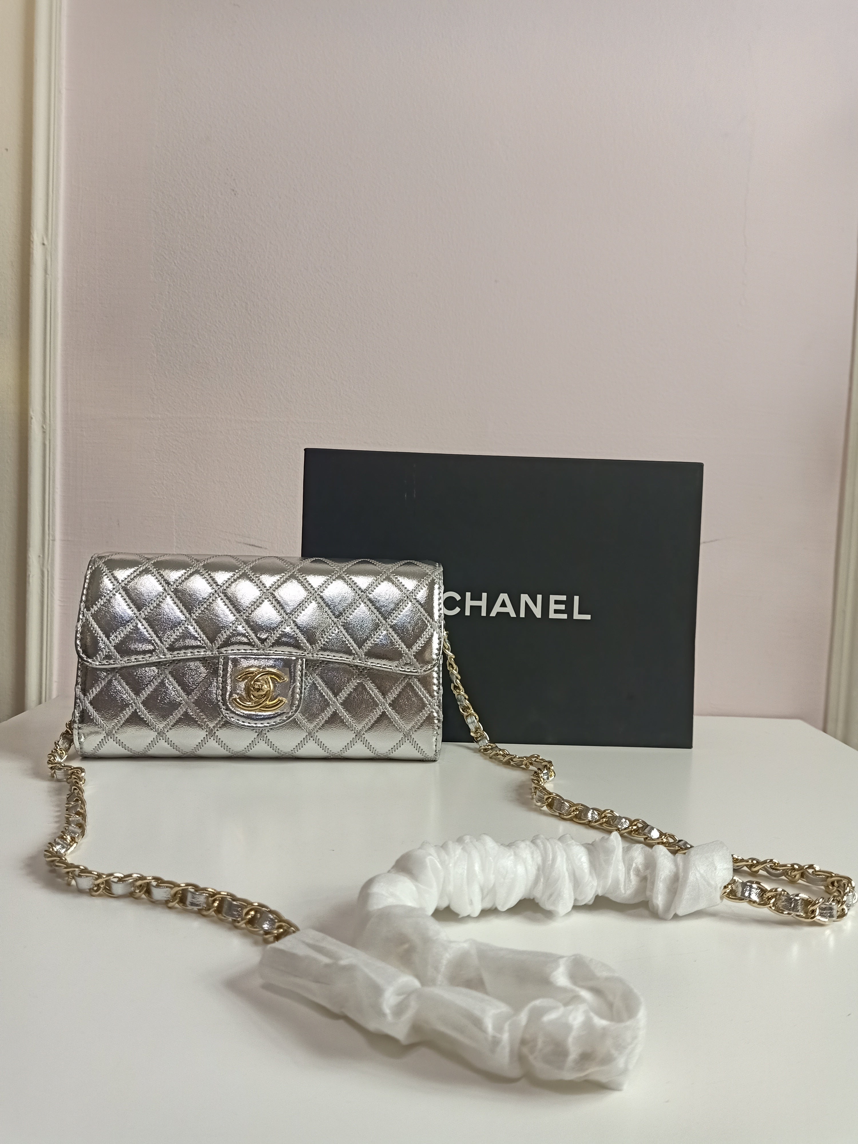 Chanel cross body in silver
