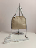Stella McCartney in gold-silver