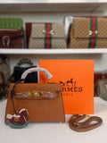 Hermes mini kelly in camel