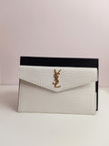 YSL clutch in shiny white-gold
