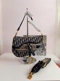 Dior saddle bag in black-beige