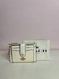Coach card holder in white