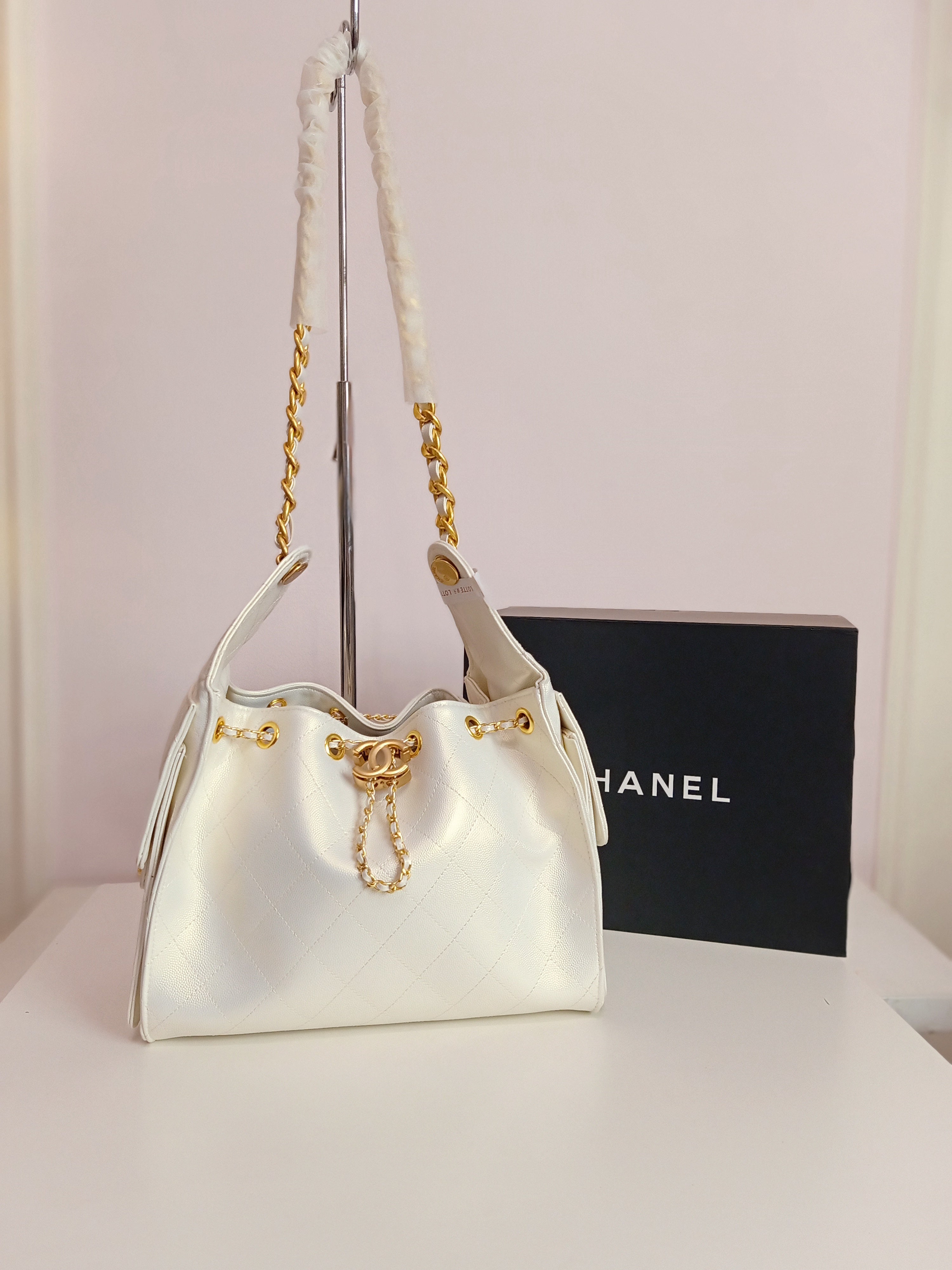 Chanel 25 mini size in off white