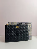 Dior clutch in black-gold