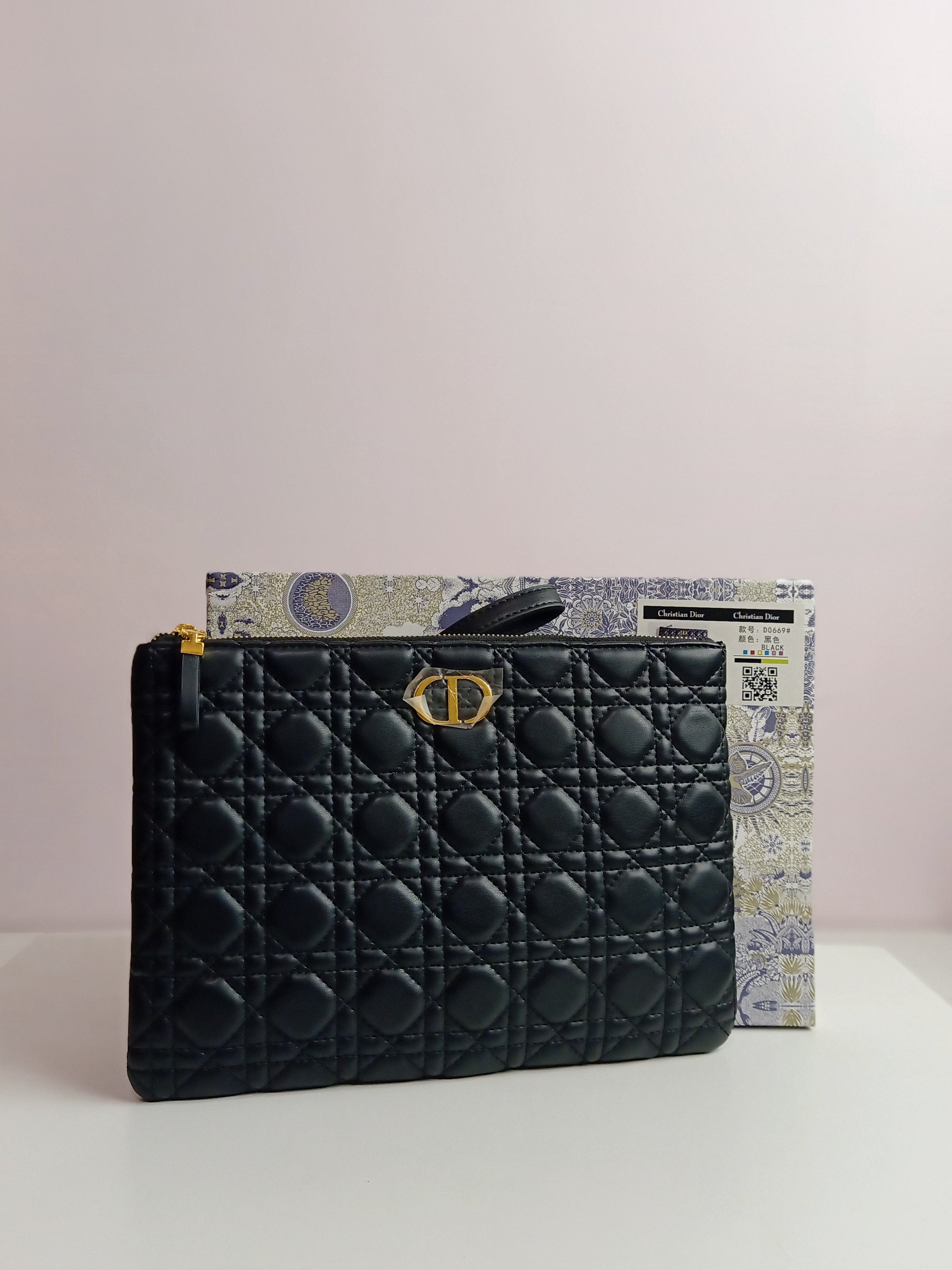 Dior clutch in black-gold