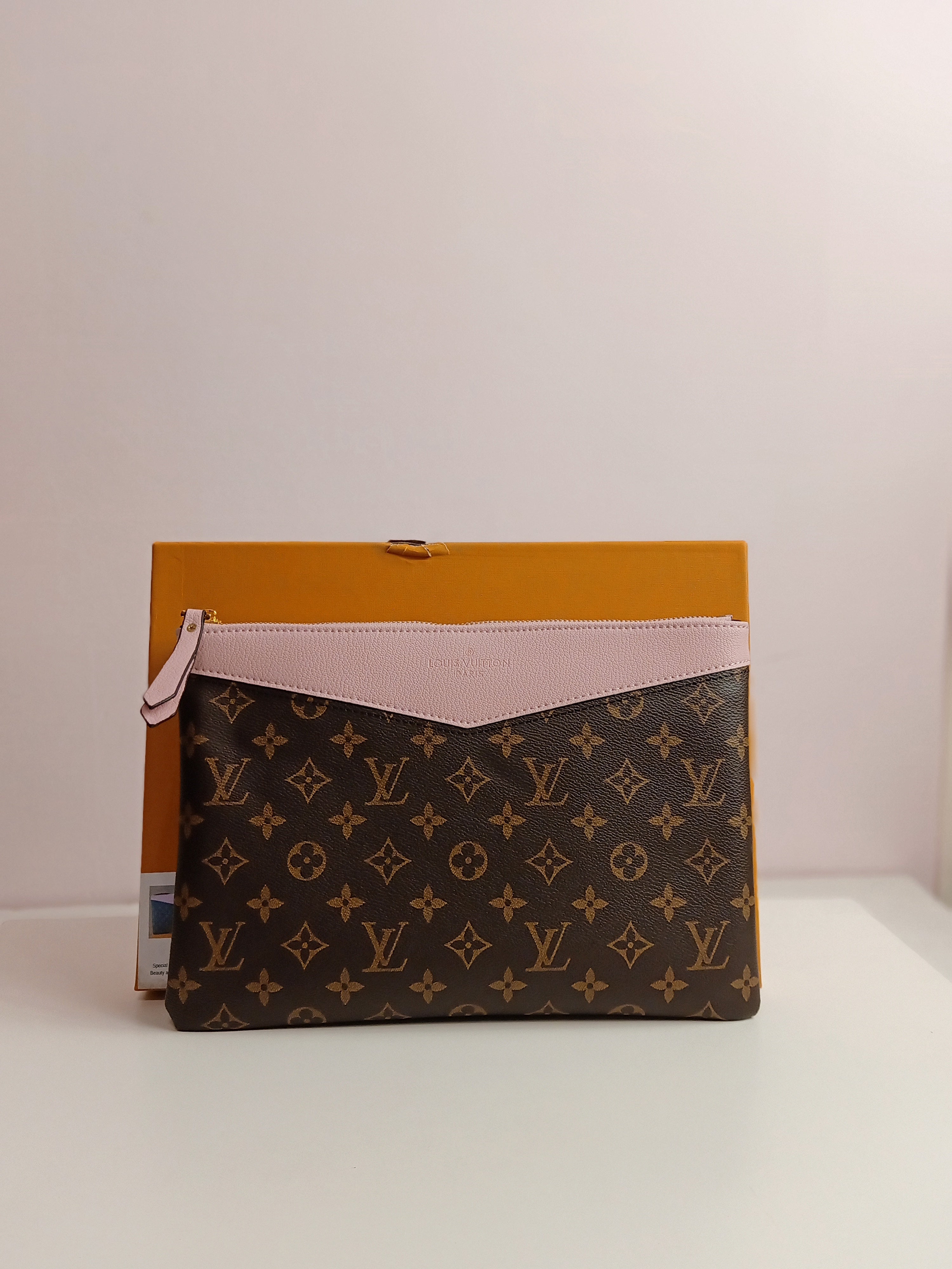 LV clutch in brown-pink