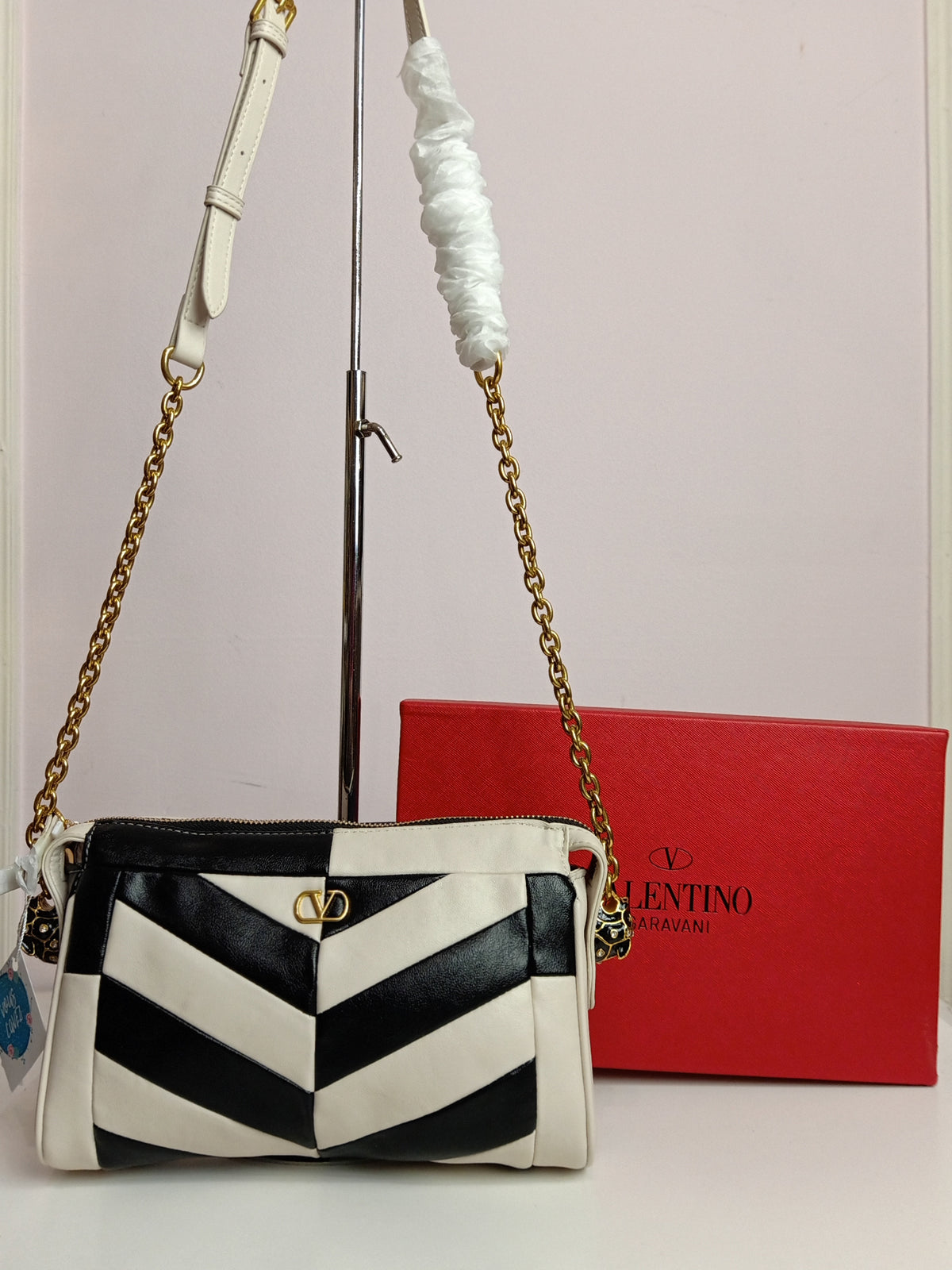 Valentino cross body bag in black-off white