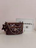 Chanel cross body in burgundy