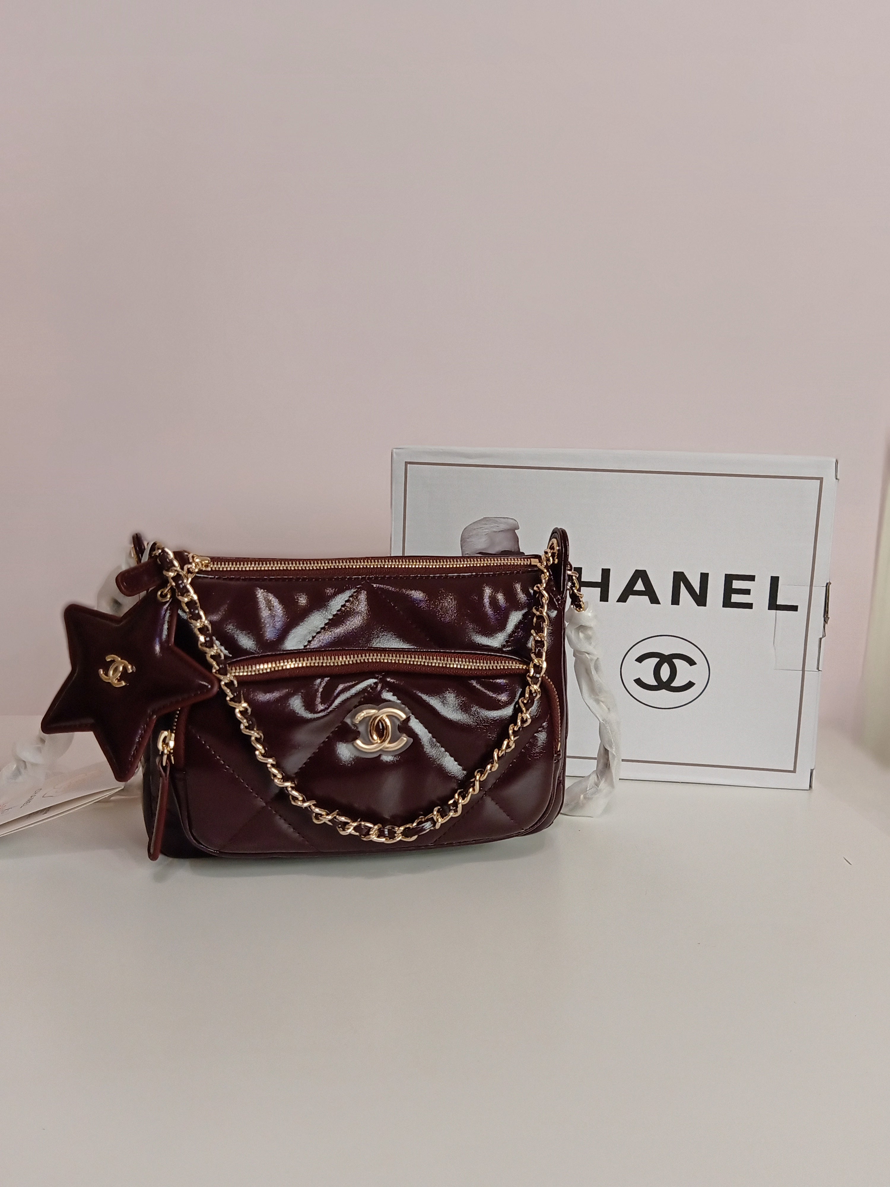 Chanel cross body in burgundy