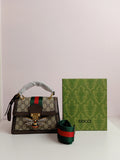 Gucci small size cross body bag in brown