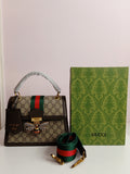 Gucci medium size cross body bag in brown