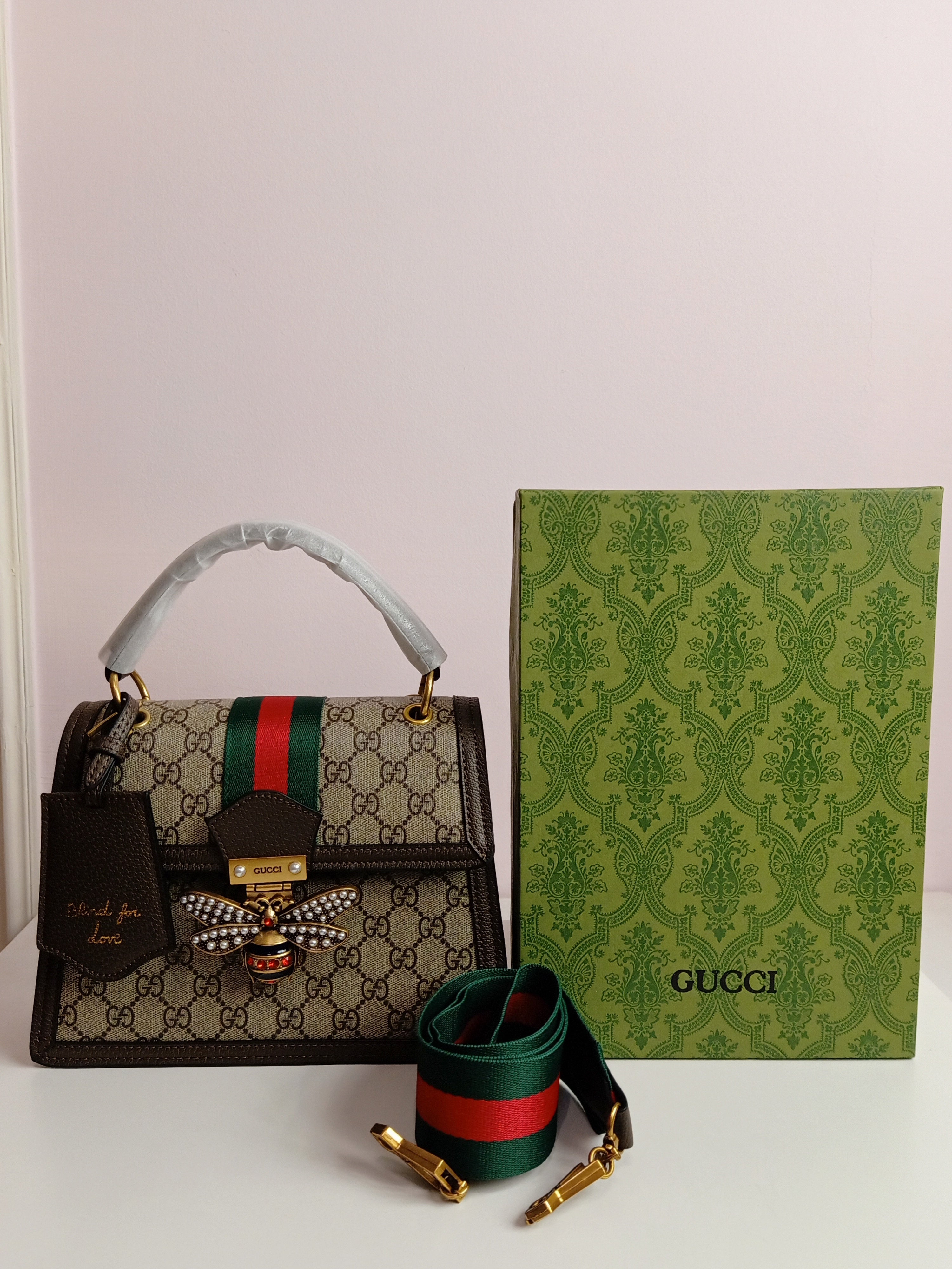 Gucci medium size cross body bag in brown