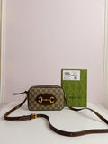 Gucci small size cross body bag in brown