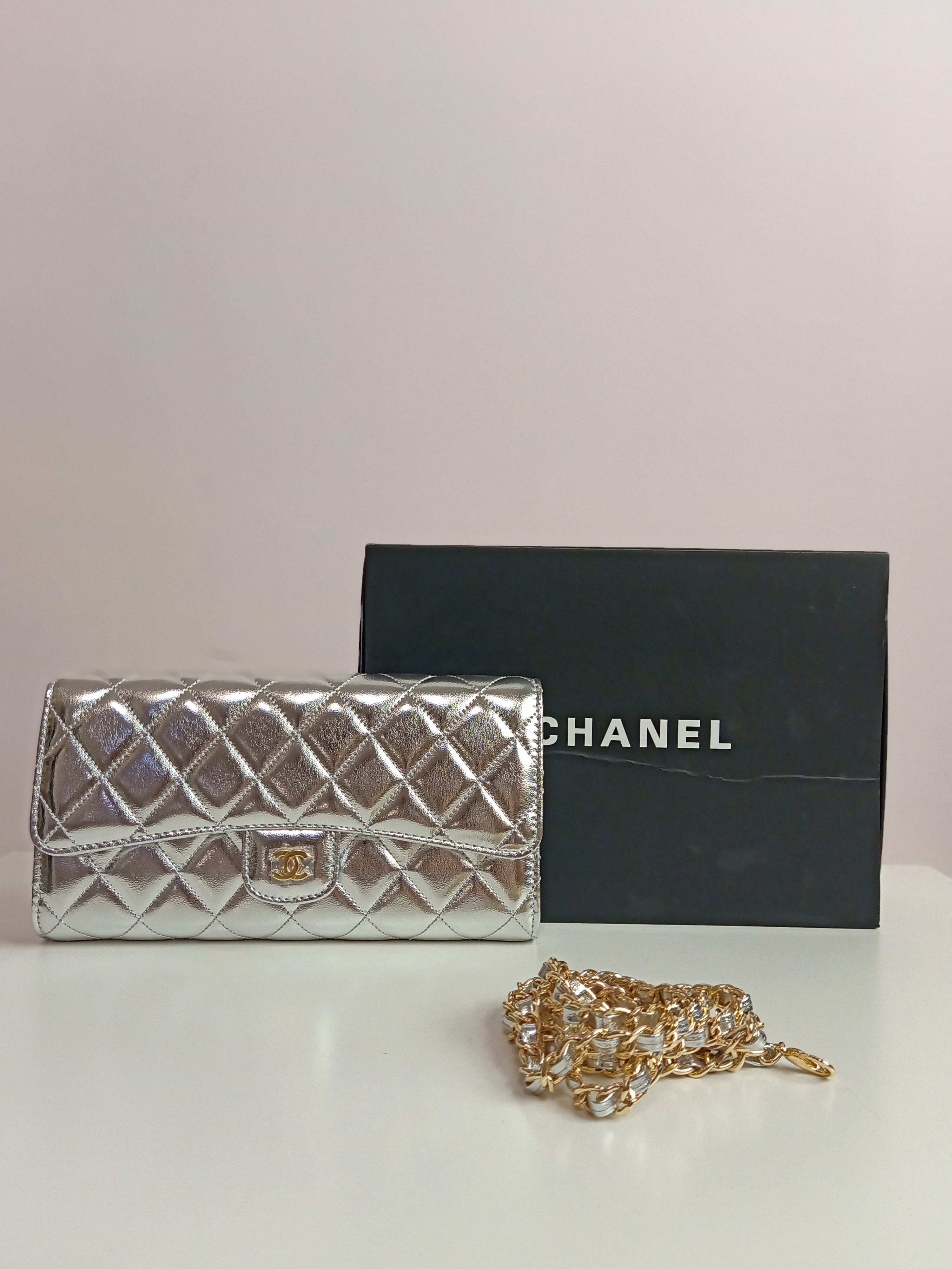 Chanel cross body bag in silver