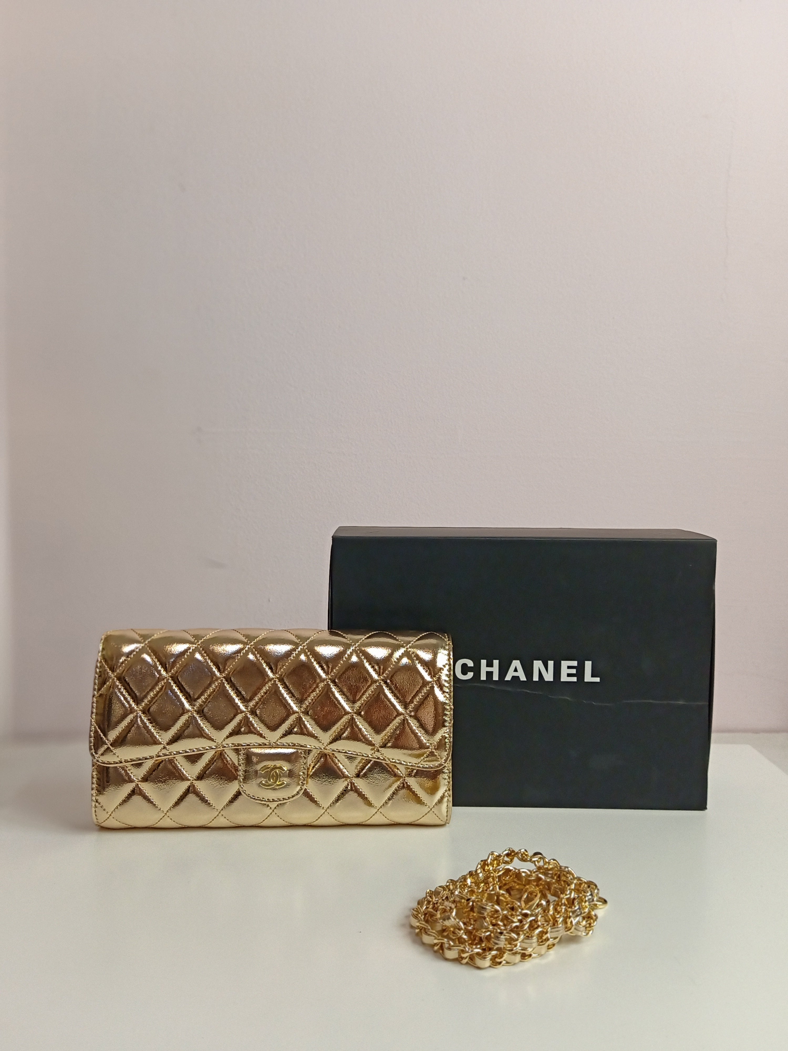 Chanel cross body bag in gold