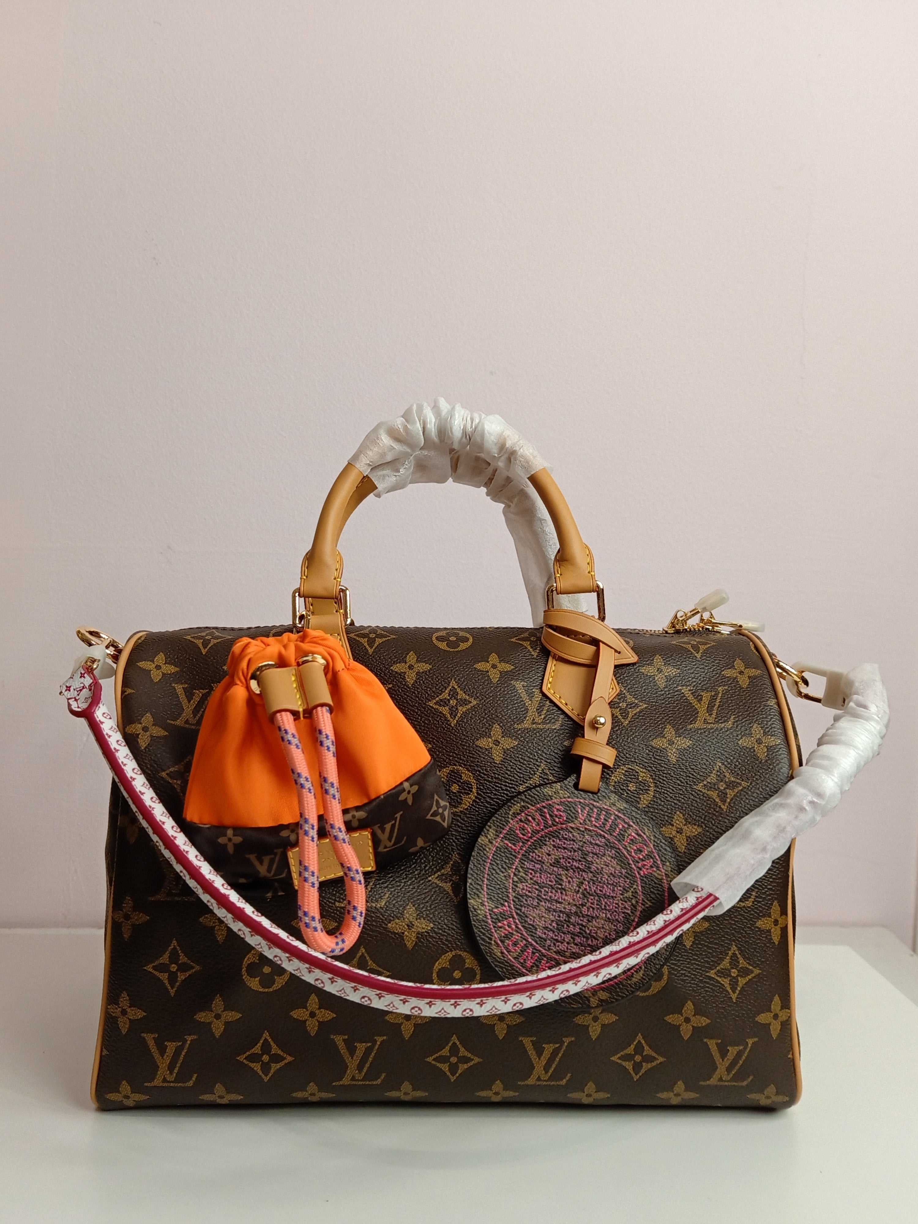 LV speedy in brown-camel-white