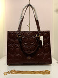 Coach tote bag in burgundy