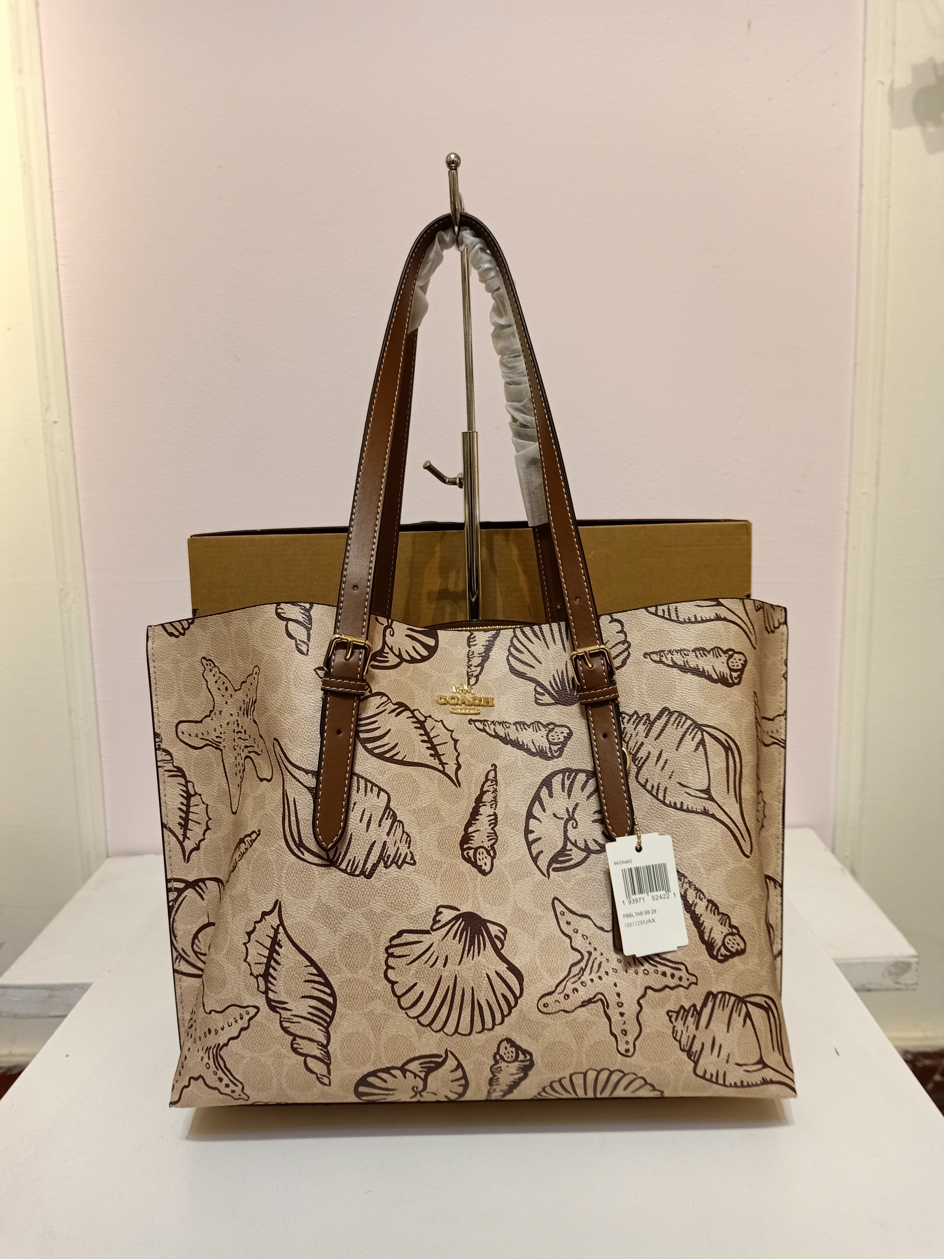 Coach shells tote bag in beige