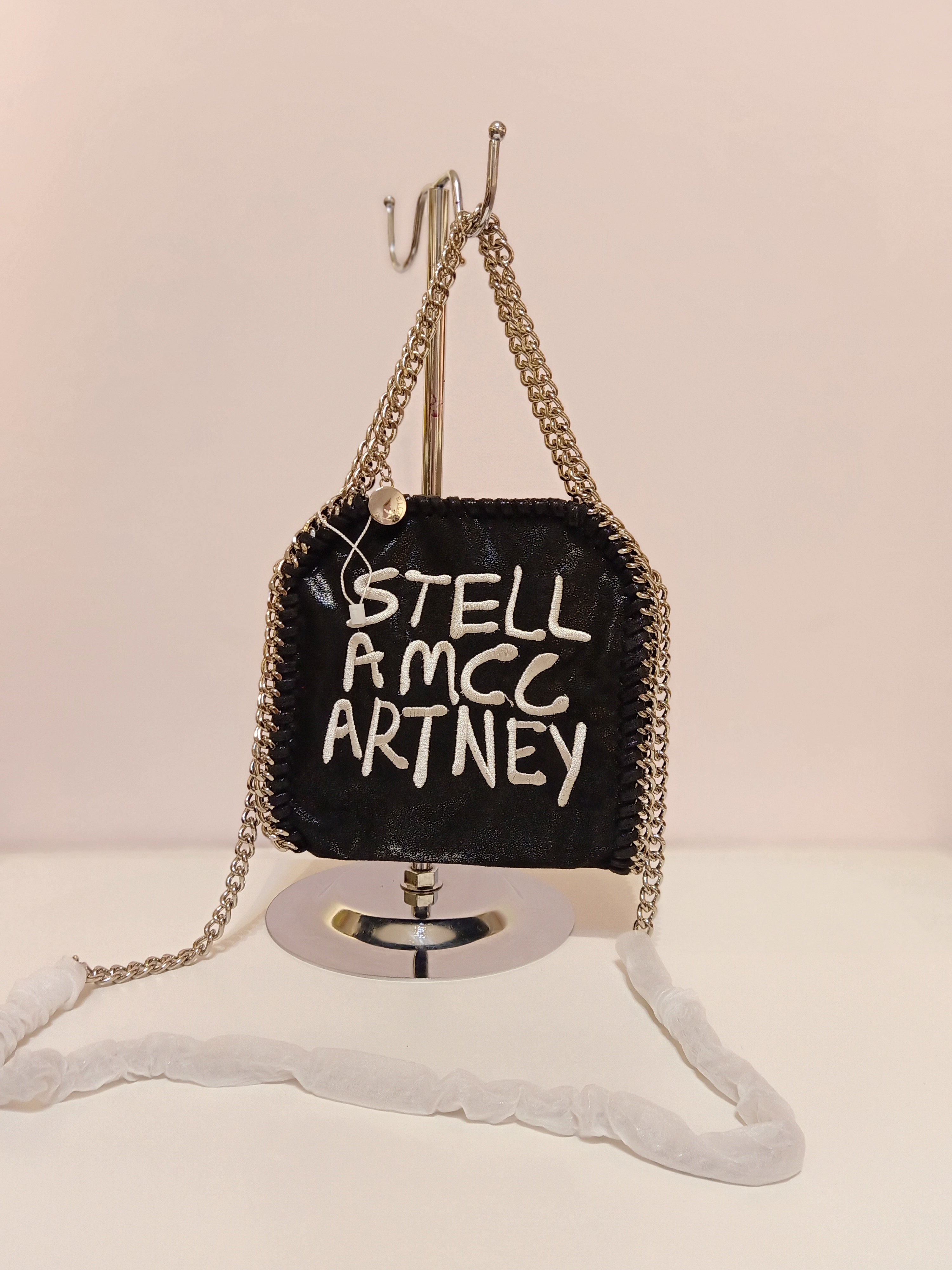 Stella Mccartney with writing in black-gold
