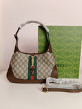 Gucci cross body bag in brown