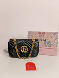 Gucci shoulder bag in black-gold