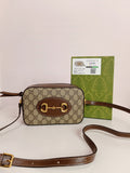 Gucci cross body bag in brown