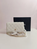 Chanel small cross body bag in white