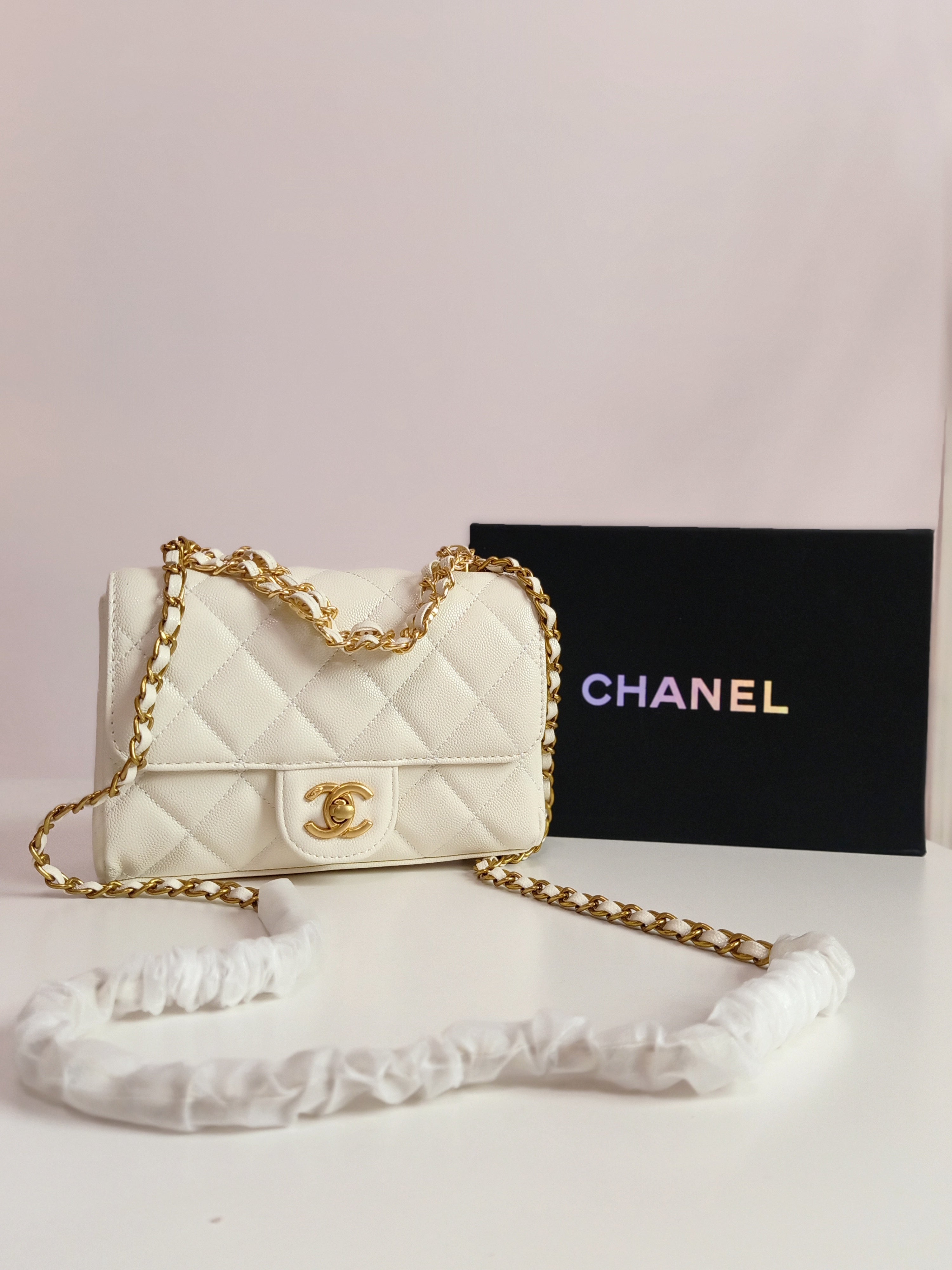 Chanel small classic flap in white-gold
