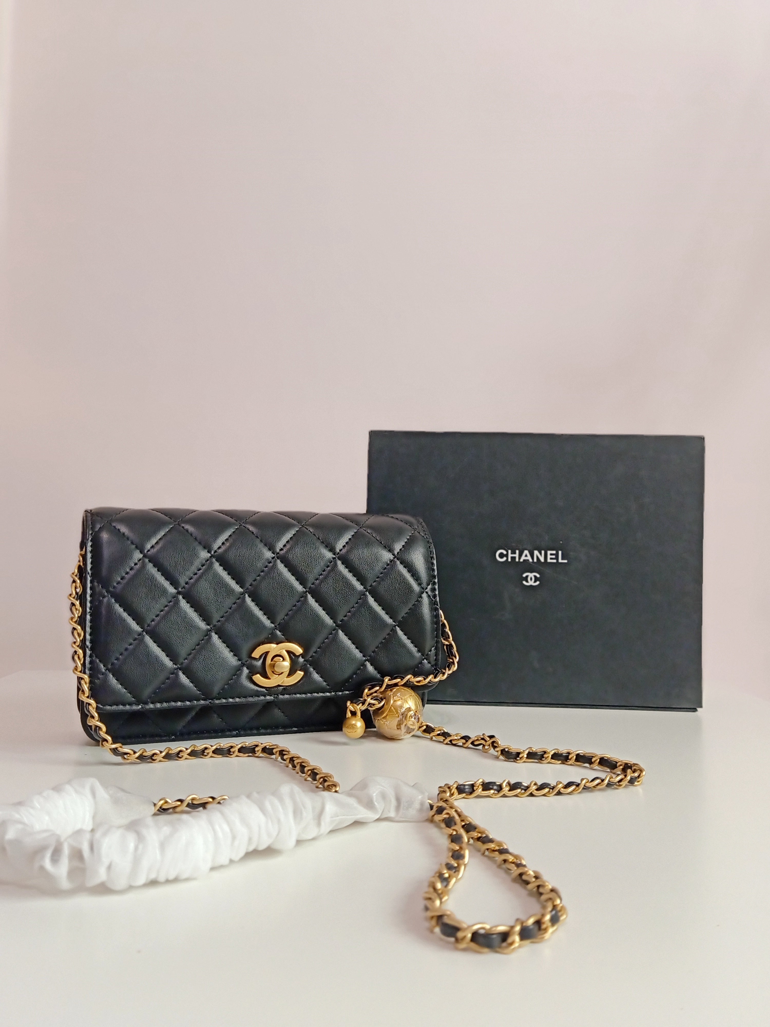 Chanel small cross body bag in black-gold