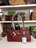 Chanel shoulder bag in burgundy