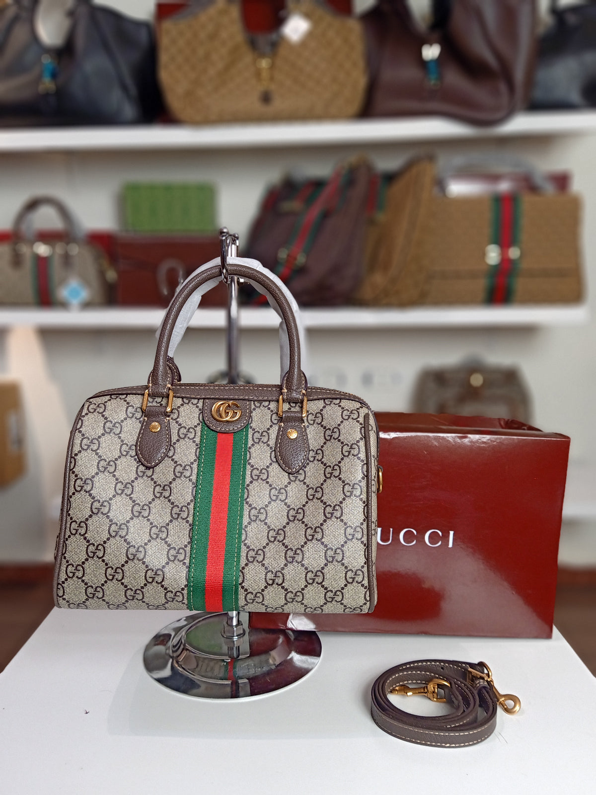 Gucci cross body bag in grayish